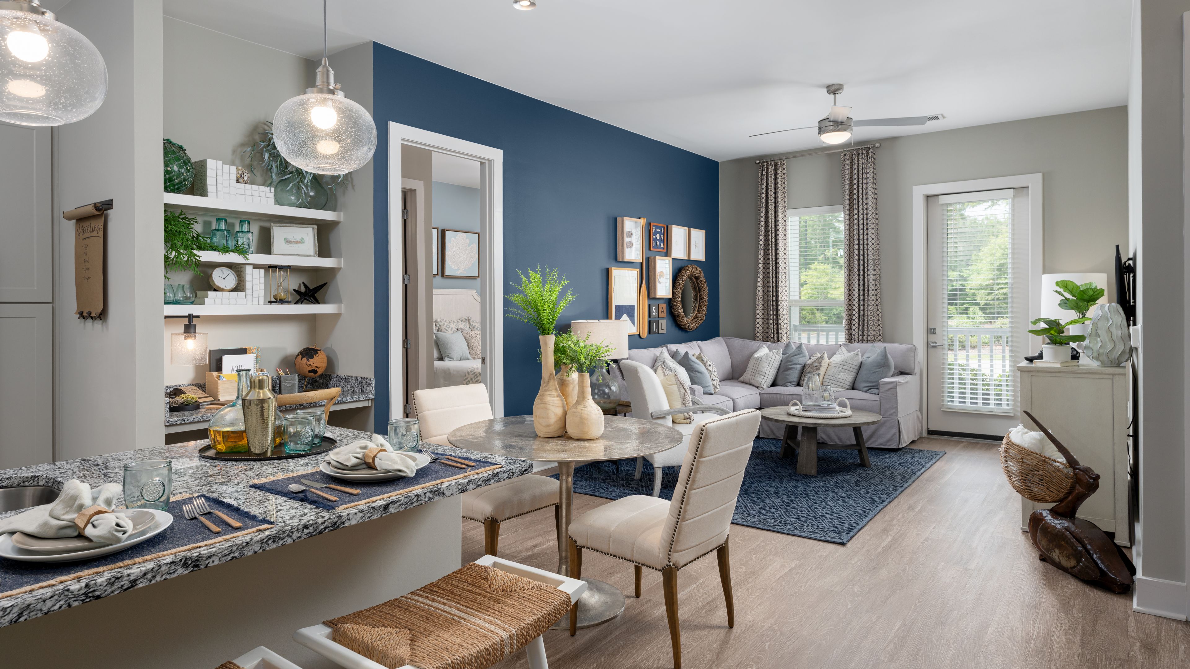 Hawthorne at Indy West outdoor courtyard with lounge area with fireplace and large screen TV